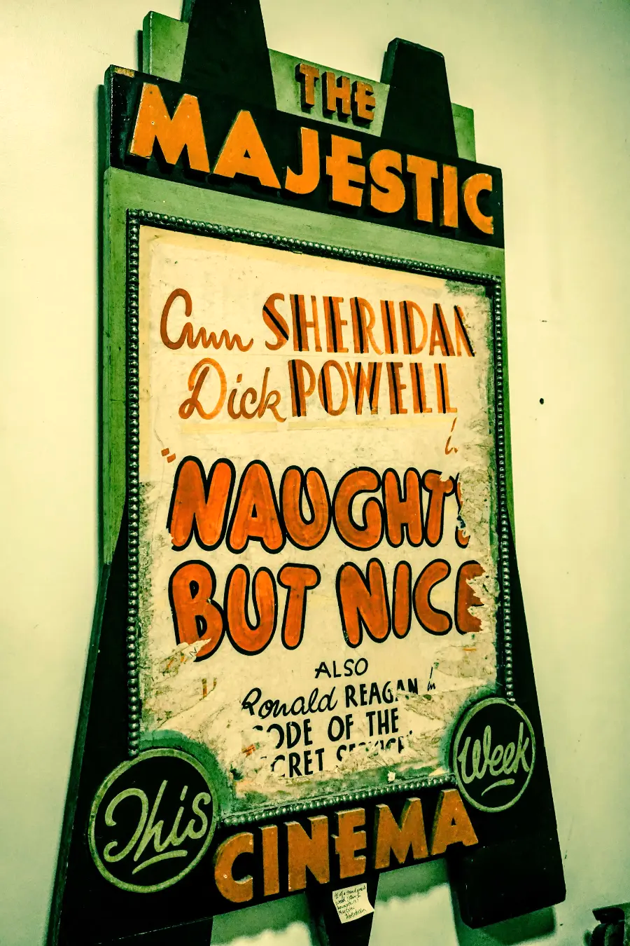 A well-worn poster for Naughty but Nice (1939) displayed in a contemporary frame branded The Majestic Cinema